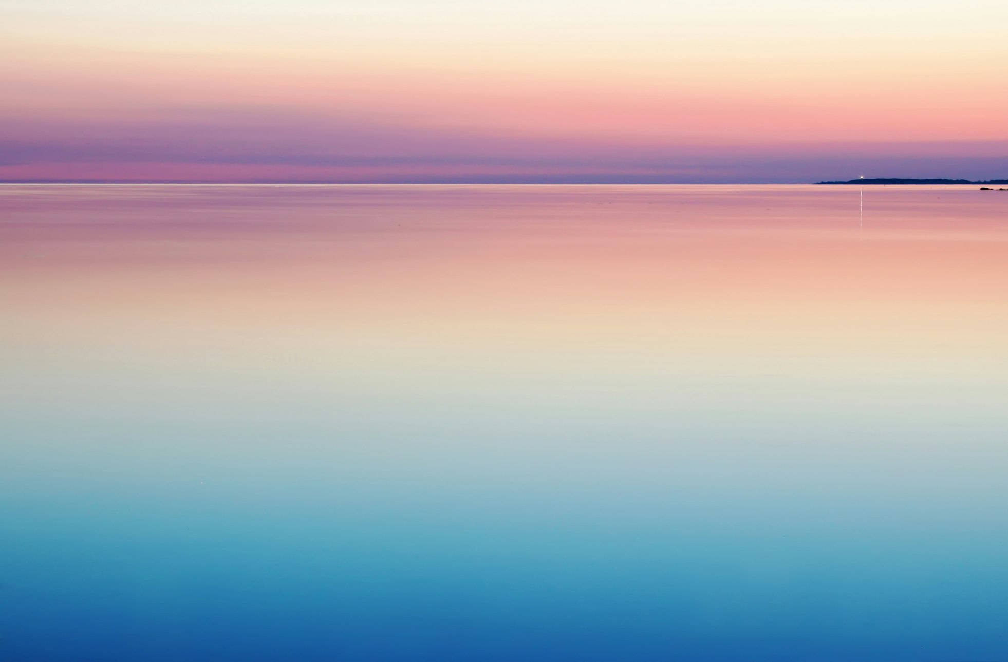 Photo of blue and pink sea by Harli Marten