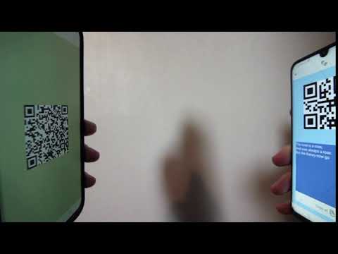 Still from demo video: two phones facing eachother with QR codes showing.